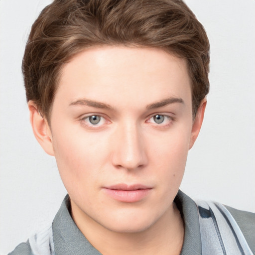 Neutral white young-adult male with short  brown hair and blue eyes