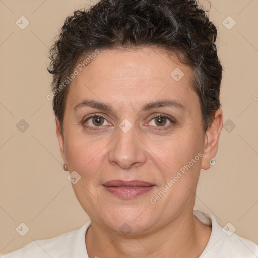 Joyful white adult female with short  brown hair and brown eyes