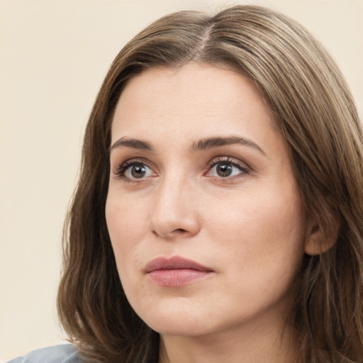 Neutral white young-adult female with medium  brown hair and brown eyes