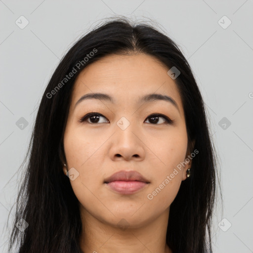 Joyful asian young-adult female with long  brown hair and brown eyes