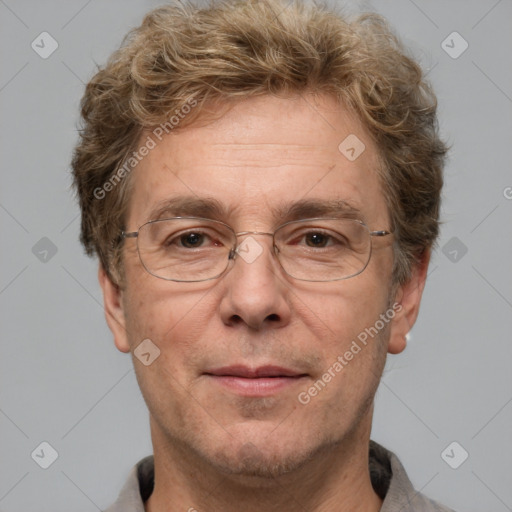 Joyful white adult male with short  brown hair and grey eyes