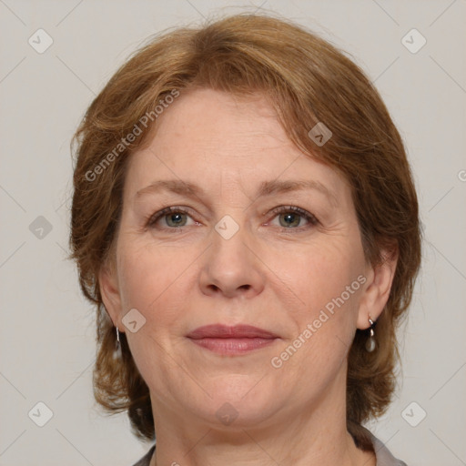 Joyful white adult female with medium  brown hair and grey eyes