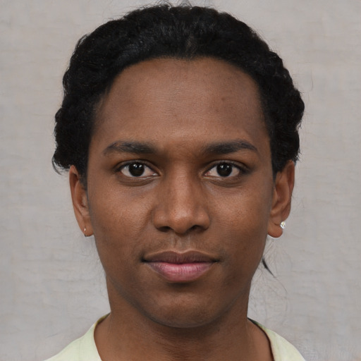 Neutral black young-adult male with short  black hair and brown eyes