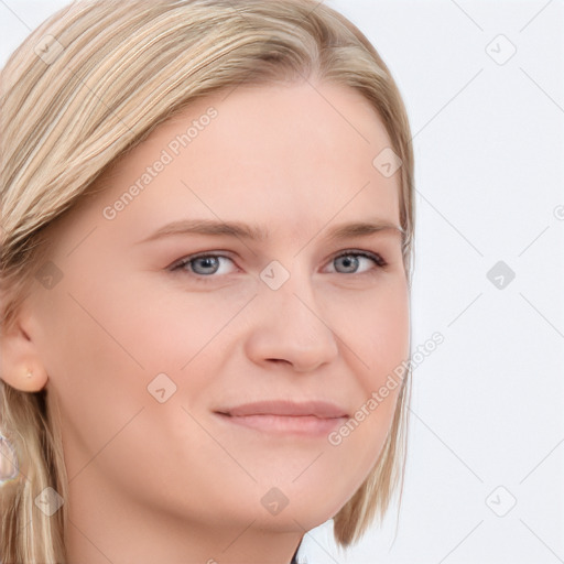 Joyful white young-adult female with long  brown hair and blue eyes