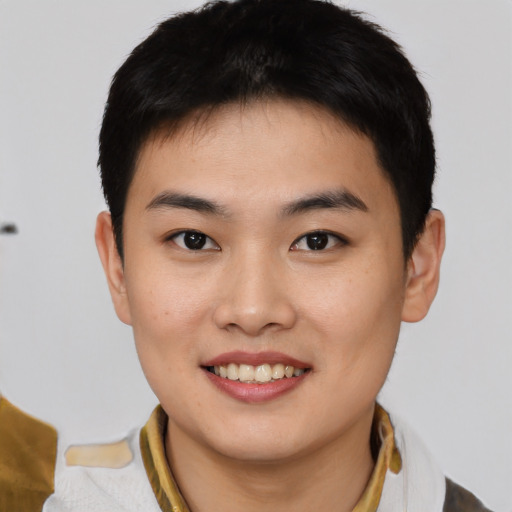 Joyful asian young-adult female with short  black hair and brown eyes