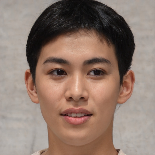 Joyful asian young-adult male with short  brown hair and brown eyes