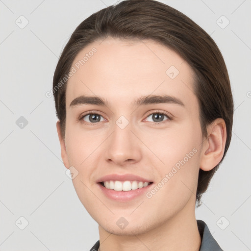 Joyful white young-adult female with short  brown hair and brown eyes