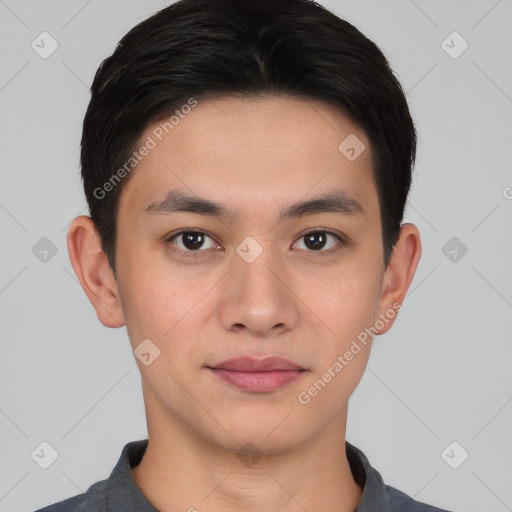 Joyful asian young-adult male with short  black hair and brown eyes