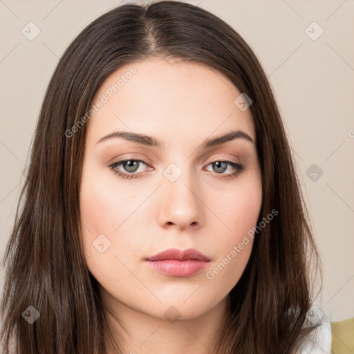 Neutral white young-adult female with long  brown hair and brown eyes