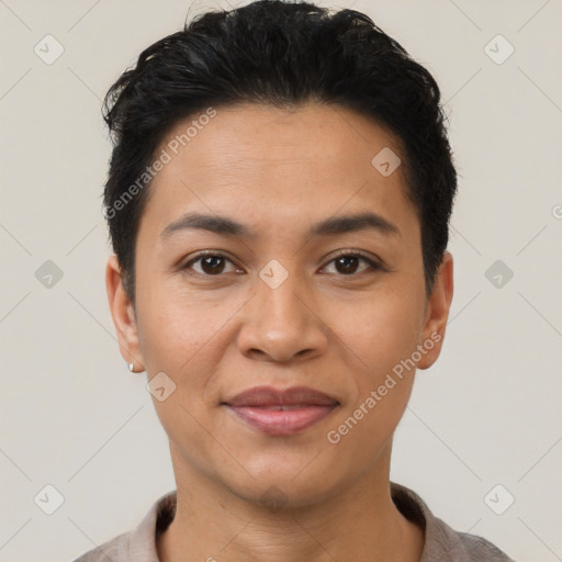 Joyful latino young-adult female with short  black hair and brown eyes