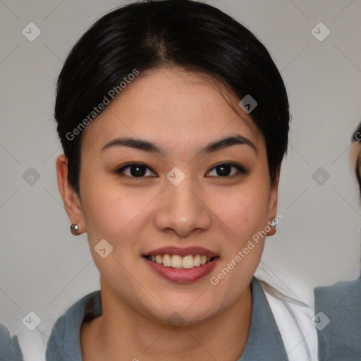 Joyful asian young-adult female with medium  brown hair and brown eyes