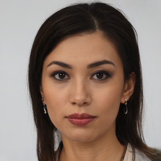 Neutral asian young-adult female with long  brown hair and brown eyes