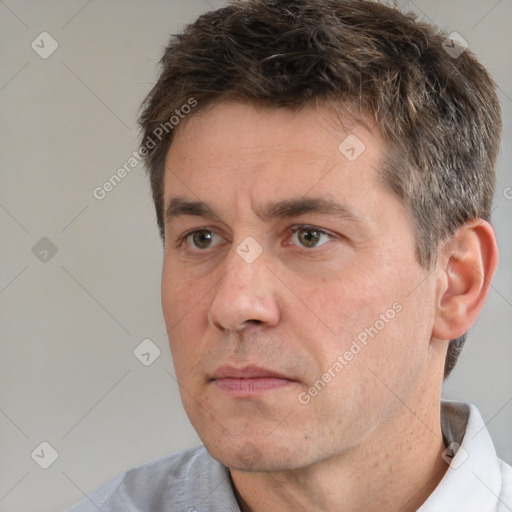 Neutral white adult male with short  brown hair and brown eyes