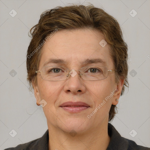 Joyful white adult female with short  brown hair and grey eyes