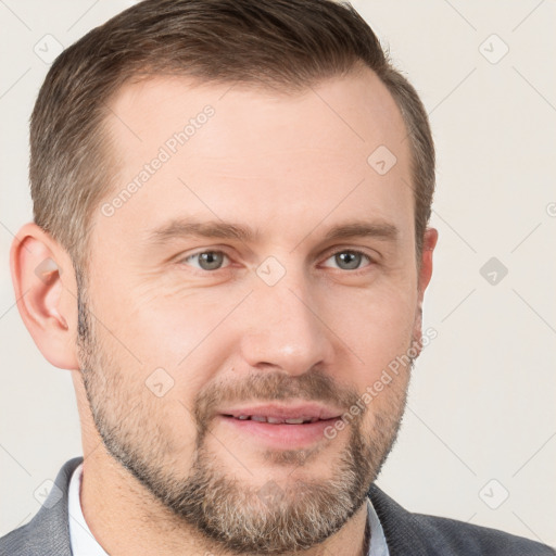 Joyful white adult male with short  brown hair and grey eyes