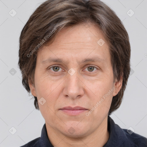 Joyful white adult male with short  brown hair and grey eyes