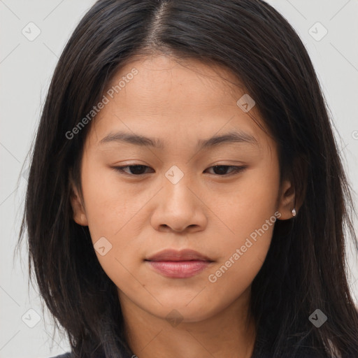 Joyful asian young-adult female with long  brown hair and brown eyes