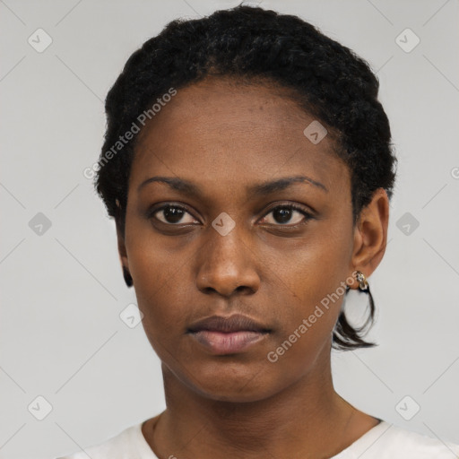 Neutral black young-adult female with short  black hair and brown eyes