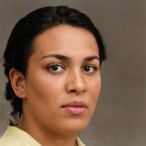 Neutral latino young-adult female with short  brown hair and brown eyes