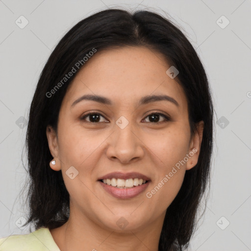 Joyful latino young-adult female with medium  brown hair and brown eyes