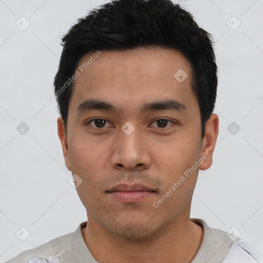 Neutral asian young-adult male with short  black hair and brown eyes