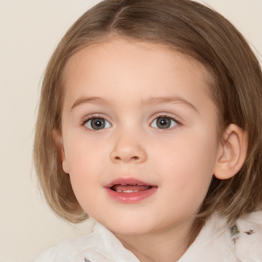 Joyful white child female with medium  brown hair and brown eyes