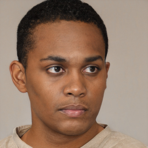 Neutral black young-adult male with short  brown hair and brown eyes