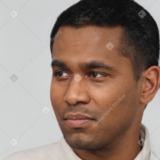 Neutral latino young-adult male with short  black hair and brown eyes