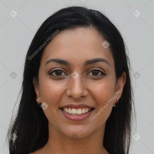 Joyful latino young-adult female with long  brown hair and brown eyes