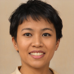 Joyful asian young-adult female with short  brown hair and brown eyes