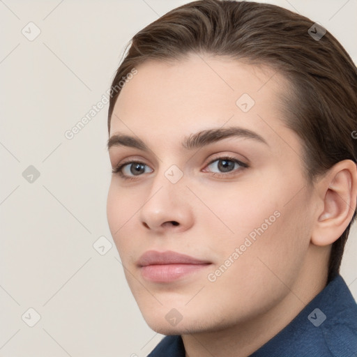 Neutral white young-adult female with short  brown hair and brown eyes