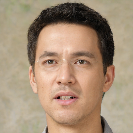 Neutral white adult male with short  black hair and brown eyes