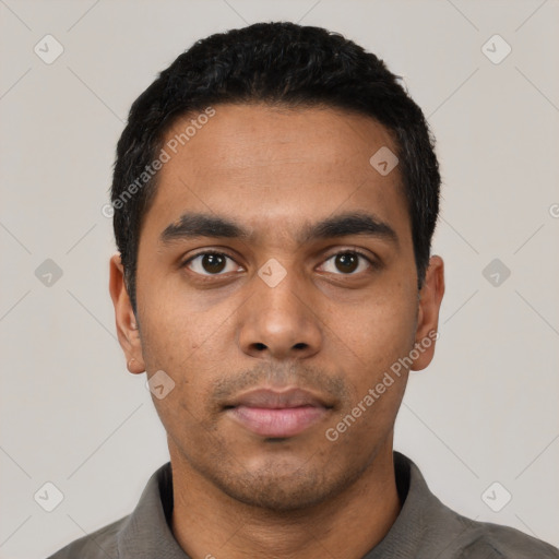 Neutral latino young-adult male with short  black hair and brown eyes