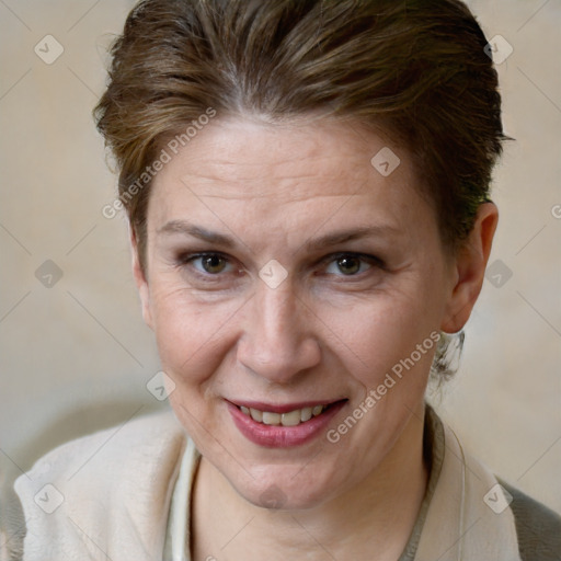 Joyful white adult female with short  brown hair and brown eyes