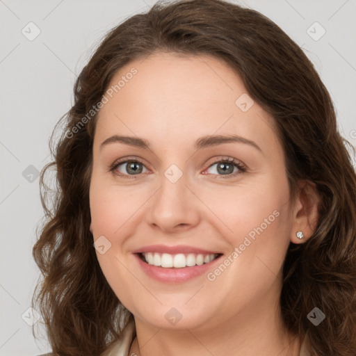 Joyful white young-adult female with medium  brown hair and green eyes