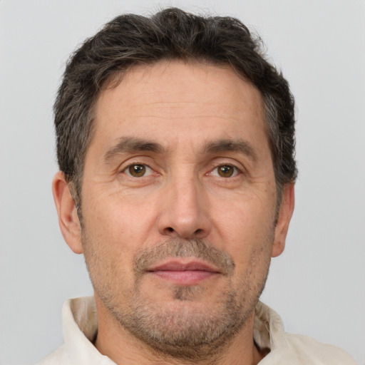 Neutral white adult male with short  brown hair and brown eyes