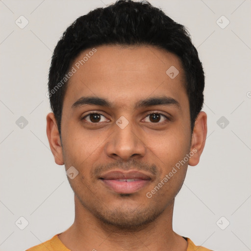 Joyful latino young-adult male with short  black hair and brown eyes