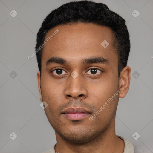 Neutral latino young-adult male with short  black hair and brown eyes