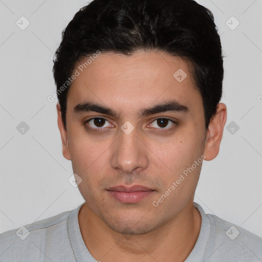 Neutral white young-adult male with short  black hair and brown eyes