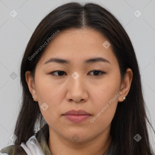 Joyful asian young-adult female with long  brown hair and brown eyes