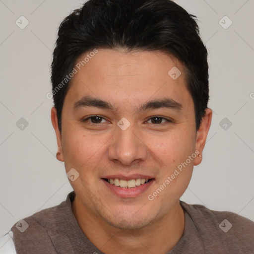 Joyful asian young-adult male with short  brown hair and brown eyes