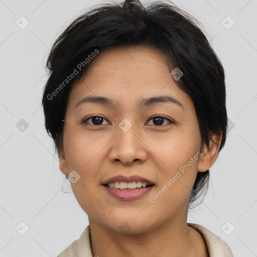 Joyful asian young-adult female with short  brown hair and brown eyes