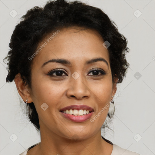 Joyful latino young-adult female with short  brown hair and brown eyes