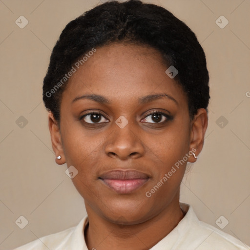 Joyful black young-adult female with short  brown hair and brown eyes