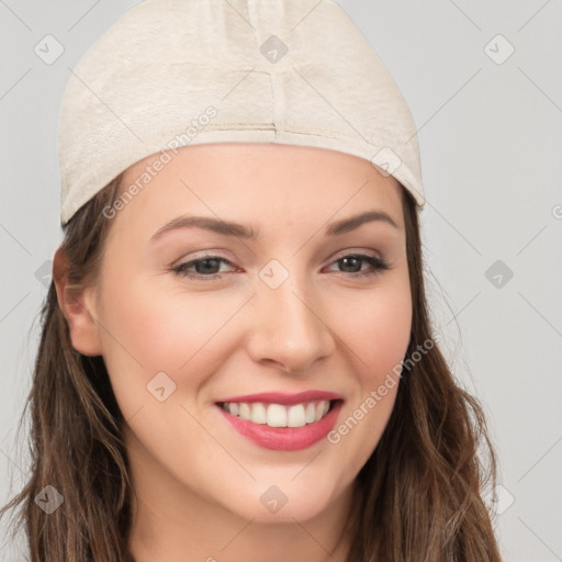 Joyful white young-adult female with long  brown hair and brown eyes