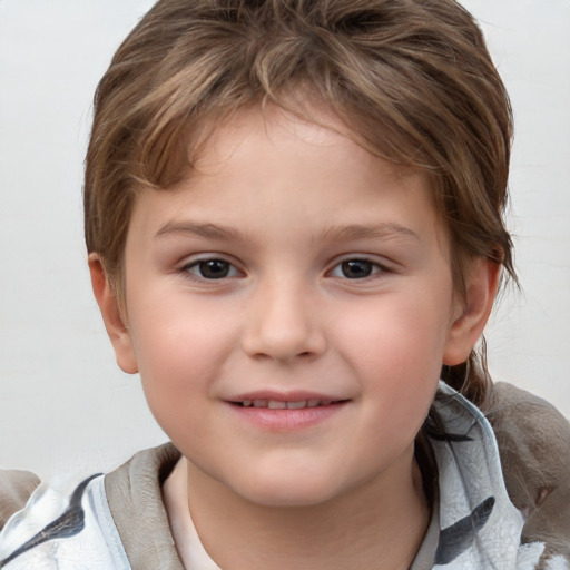 Joyful white child female with short  brown hair and brown eyes