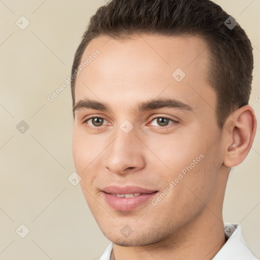 Joyful white young-adult male with short  brown hair and brown eyes