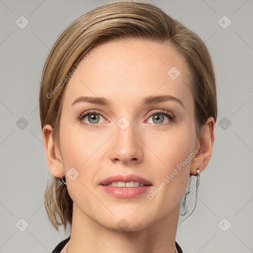 Joyful white young-adult female with medium  brown hair and grey eyes