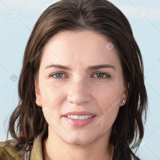 Joyful white young-adult female with medium  brown hair and grey eyes