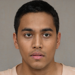 Neutral latino young-adult male with short  black hair and brown eyes